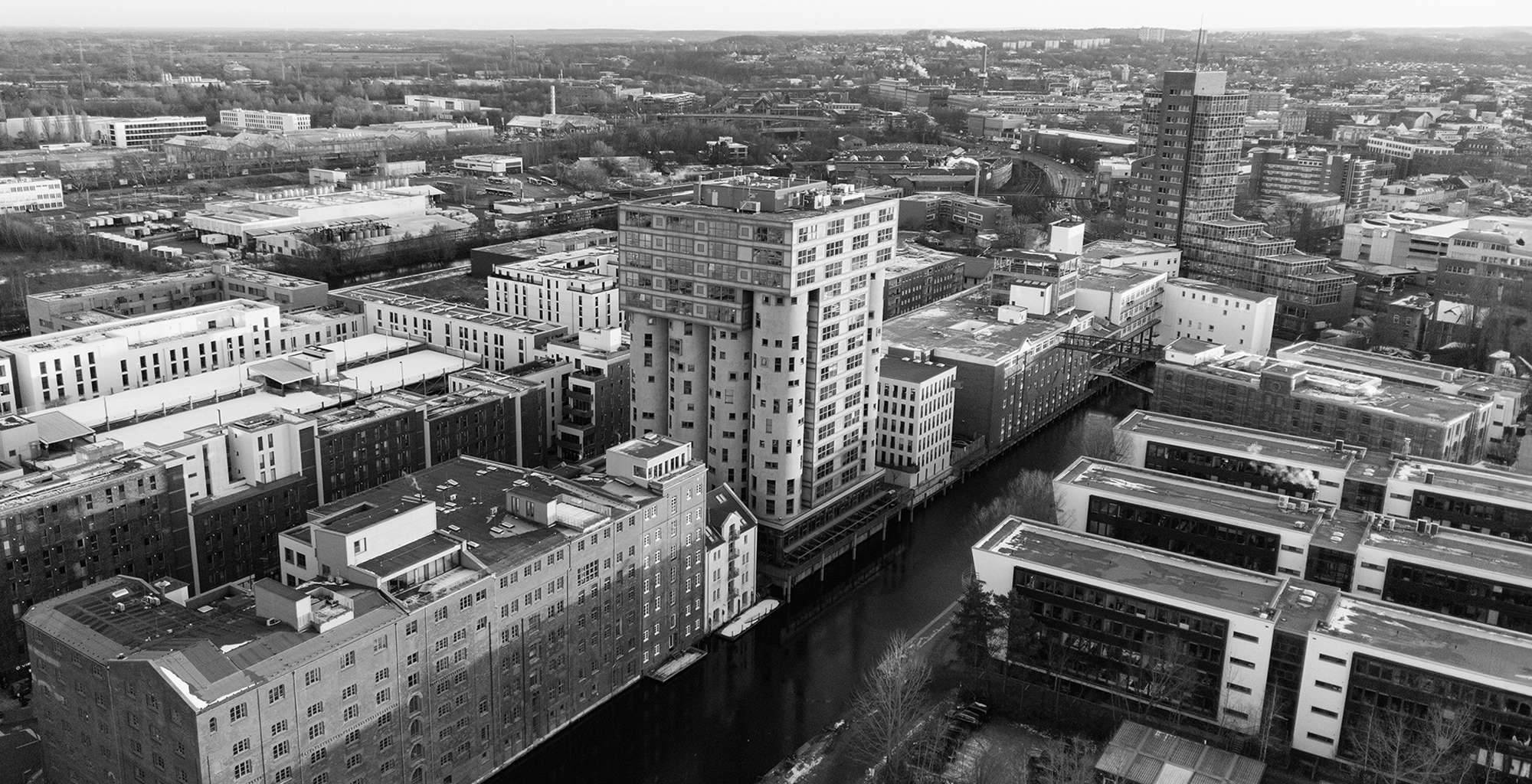 Aerial view of Hamburg-Harburg with canal and harbor buildings